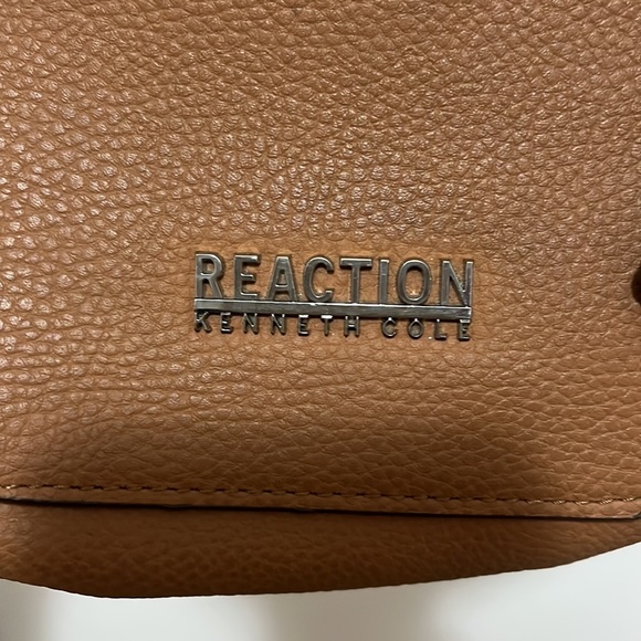 Crossbody. Adjustable strap. Carried about 3 times. No tears/stains/holes. - Picture 7 of 8